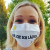 Gesichtsmaske Mund - Nasenschutz wiederverwendbar lustig mit Humor / Sprüche mit "Ehrlich! Ich Lächle!" aus Schonach im Schwarzwald